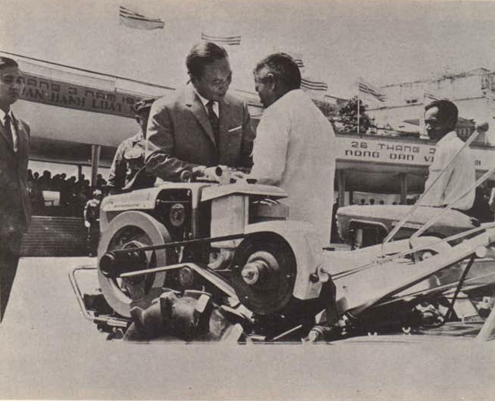 Photograph of President Nguyễn Văn Thiệu at farmers' event. Caption: I am determined to bring back to the Fatherland Peace in Freedom and Prosperity.
