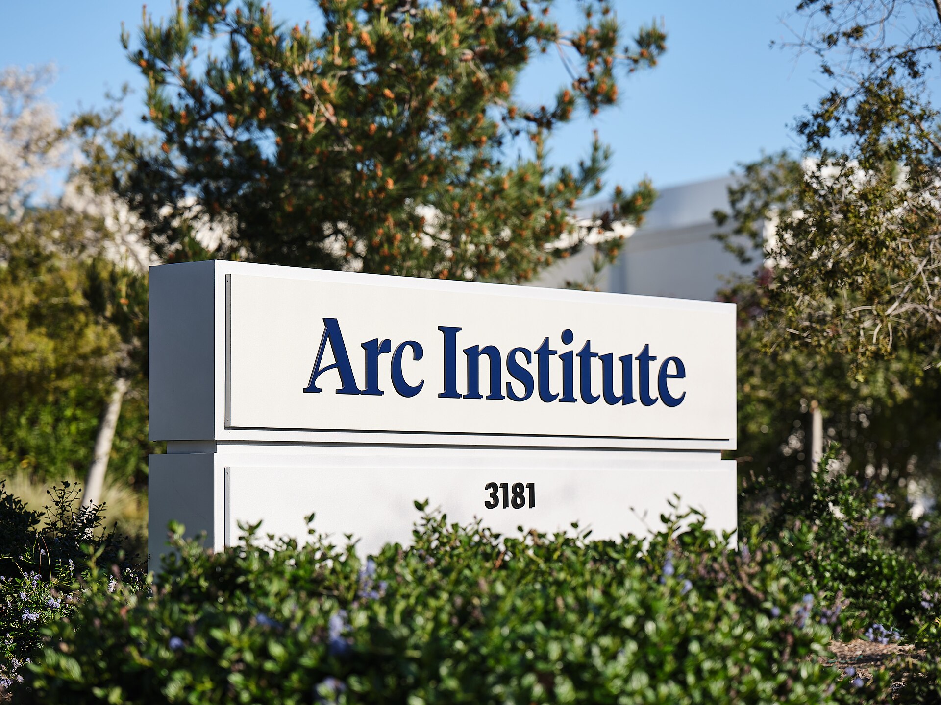 The sign with the Arc Institute’s logo outside the Arc Institute building in Palo Alto, California