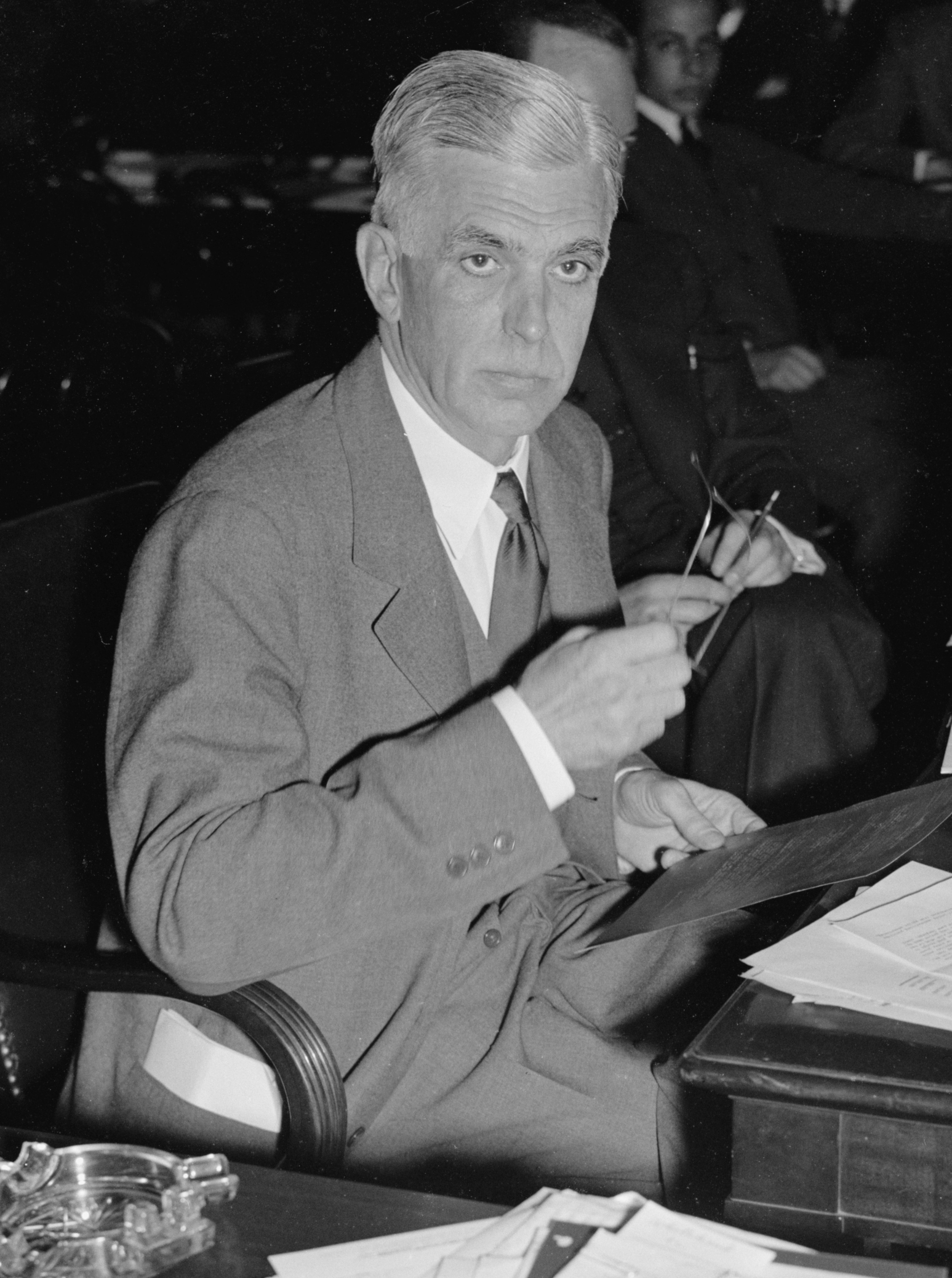Harold Stanley, President of Morgan Stanley, testifying before the National Monopoly Committee on Dec. 19, 1939. Image cropped using Photo Editor at https://www.befunky.com/create/
