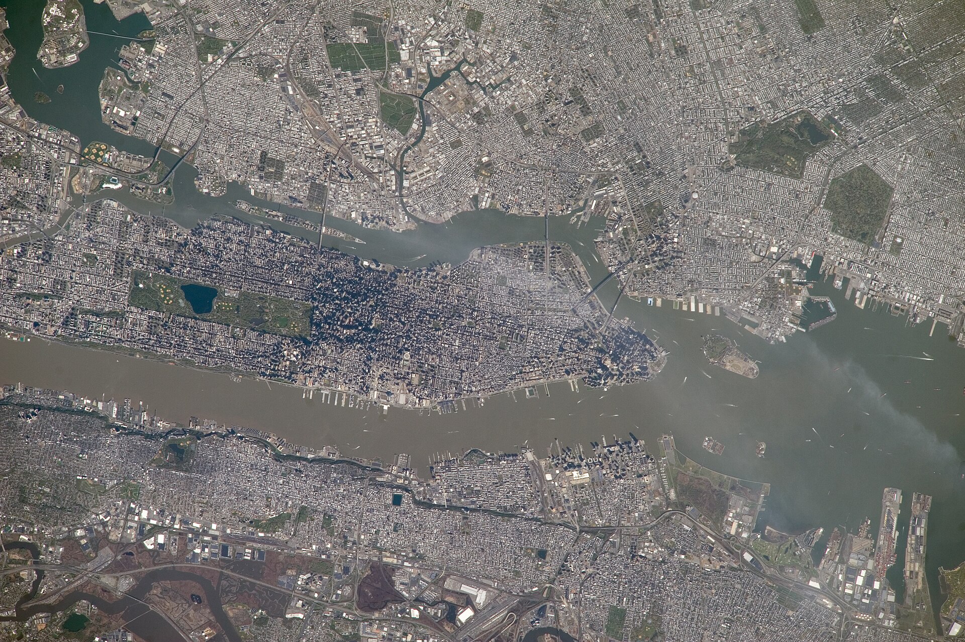 New York City is featured in this image photographed by an Expedition 39 crew member on the International Space Station. This detailed image reveals the narrow shape of Manhattan located between the H