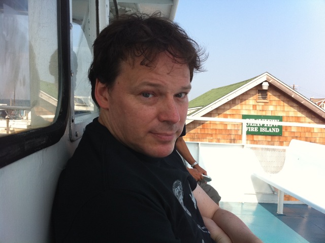 David Graeber on a boat at Fire Island.